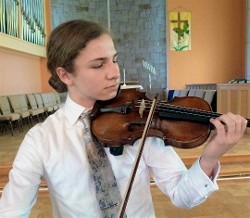 Violinst Danilo Thurber, co-winner of LRSO's student concerto competition, performs with the Lakes Region Symphony Orchestra on March 24, 2018 at Inter-lakes Auditorium in Meredith.